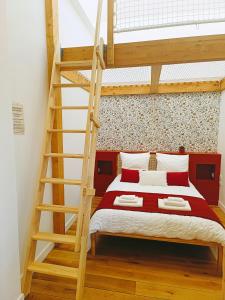 Postel nebo postele na pokoji v ubytování Loft 23 - Appartement lumineux 4 chambres hyper centre de Cholet