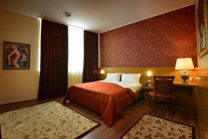 Postel nebo postele na pokoji v ubytování Hotel Austria