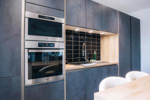 Η κουζίνα ή μικρή κουζίνα στο La Villa Marais