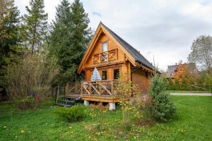 Κήπος έξω από το Domki Janosik - Prywatny stylowy domek w górach, przyjazny psom, ogrodzony ogród