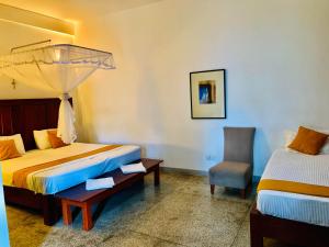 Ένα ή περισσότερα κρεβάτια σε δωμάτιο στο Airport Heritage +34 φωτογραφίες