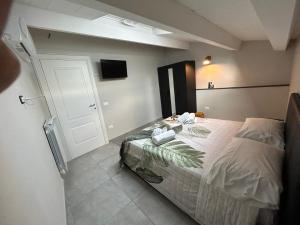 Ένα ή περισσότερα κρεβάτια σε δωμάτιο στο Maison Vanvitelli