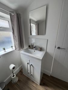 Et badeværelse på Cinema room apartment 1