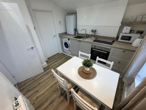 Køkken eller tekøkken på Cinema room apartment 1 + 5 billeder