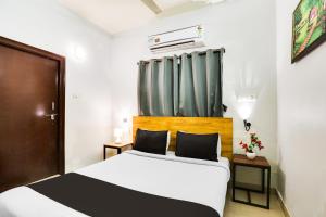 Ένα ή περισσότερα κρεβάτια σε δωμάτιο στο Hotel O Dream Nest