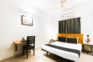 Ένα ή περισσότερα κρεβάτια σε δωμάτιο στο Hotel O Dream Nest