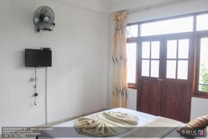 TV a/nebo společenská místnost v ubytování New Ella Nature View