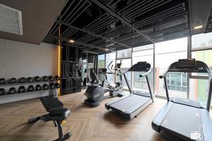 Fitnesscentret og/eller fitnessfaciliteterne på PROMO Luxury 2BR SuitePrime Spot