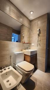 Koupelna v ubytování Complejo brisas mar de las pampas