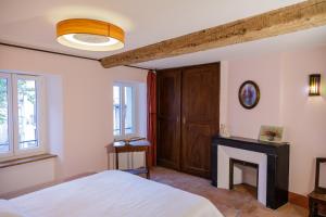 Postel nebo postele na pokoji v ubytování Ostal de la placette