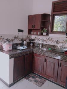 Kuchyň nebo kuchyňský kout v ubytování Free Breeze Guest & Villa