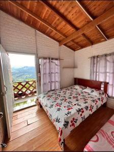 Ένα ή περισσότερα κρεβάτια σε δωμάτιο στο Mirador buena vida