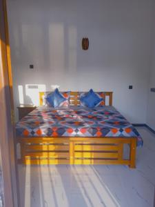 Postel nebo postele na pokoji v ubytování Free Breeze Guest & Villa