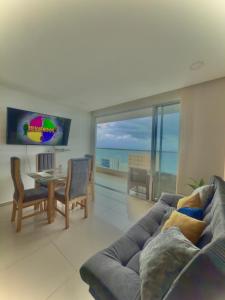 TV a/nebo společenská místnost v ubytování Condo con vista al mar