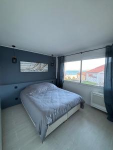 Postel nebo postele na pokoji v ubytování La Corniche