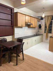 Kuchyň nebo kuchyňský kout v ubytování The urban rest