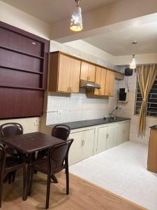 Kuchyň nebo kuchyňský kout v ubytování The urban rest