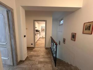 a hallway of a home with a stairway at SalitaCentrale6 in Bellagio