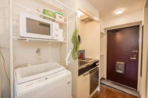 東京にあるsakura 202の小さなキッチン(電子レンジ、コンロ付)
