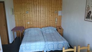 Postel nebo postele na pokoji v ubytování Chalet Gabriel