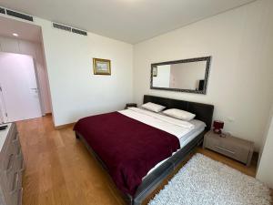 Postel nebo postele na pokoji v ubytování Queen BW