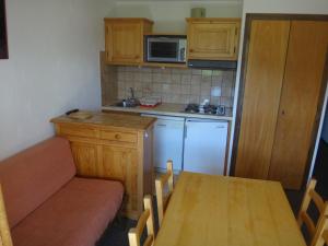 Kuchyň nebo kuchyňský kout v ubytování Chalet Gabriel