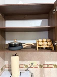 Η κουζίνα ή μικρή κουζίνα στο Oliva Home, 1 cama, 2 baños +5 φωτογραφίες