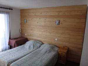 Postel nebo postele na pokoji v ubytování Chalet Gabriel
