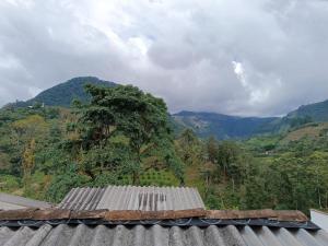 a view of a mountain from a roof at Habitacion Privada en Jardin cerca al parque in Jardin