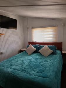 Postel nebo postele na pokoji v ubytování Cabaña Alba