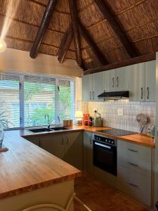 Η κουζίνα ή μικρή κουζίνα στο Tranquility