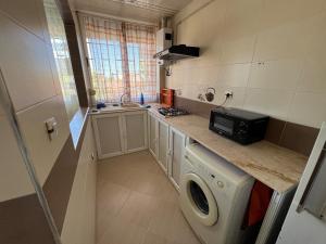 Η κουζίνα ή μικρή κουζίνα στο Very well located F1 studio +16 φωτογραφίες