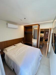 Ένα ή περισσότερα κρεβάτια σε δωμάτιο στο Salinas Premium Resort +16 φωτογραφίες