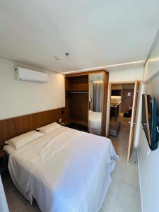 Ένα ή περισσότερα κρεβάτια σε δωμάτιο στο Salinas Premium Resort