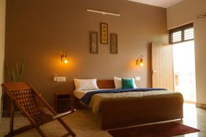 Ένα ή περισσότερα κρεβάτια σε δωμάτιο στο Happy Home Jaipur - Peaceful Villa with Garden