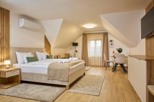 Postel nebo postele na pokoji v ubytování Villa Olea