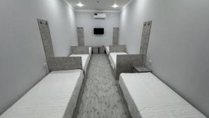 Ένα ή περισσότερα κρεβάτια σε δωμάτιο στο Art Guest House Hostel