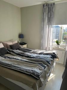 Postel nebo postele na pokoji v ubytování Bina71