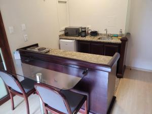 Kuchyň nebo kuchyňský kout v ubytování Apartamento no Hotel Prinz