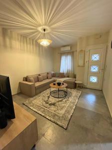 Posezení v ubytování The Cozy Cottage