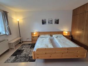 En eller flere senge i et værelse på FeWo im Grünen