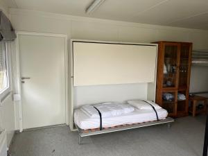 Ένα ή περισσότερα κρεβάτια σε δωμάτιο στο Maikes home