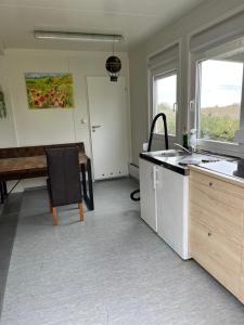 Η κουζίνα ή μικρή κουζίνα στο Maikes home