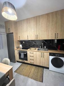 Kuchyň nebo kuchyňský kout v ubytování The Cozy Cottage