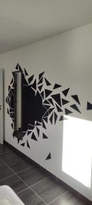 TV a/nebo společenská místnost v ubytování Le Petit Clazayéen