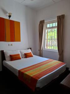 Postel nebo postele na pokoji v ubytování Villa hikka hills