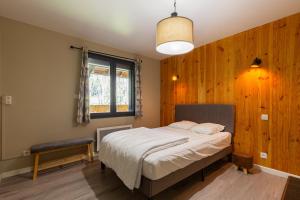 Postel nebo postele na pokoji v ubytování Appartement tout confort , centre Loudenvielle