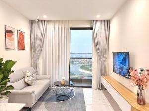 TV a/nebo společenská místnost v ubytování Vie Home