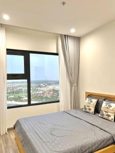 Postel nebo postele na pokoji v ubytování Vie Home