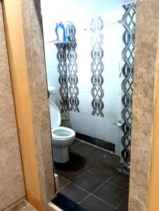 Ένα μπάνιο στο Shree Narayana Guest House